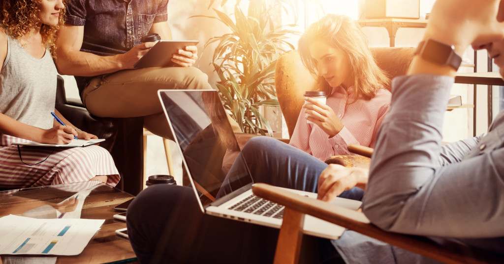 people working on their gadgets