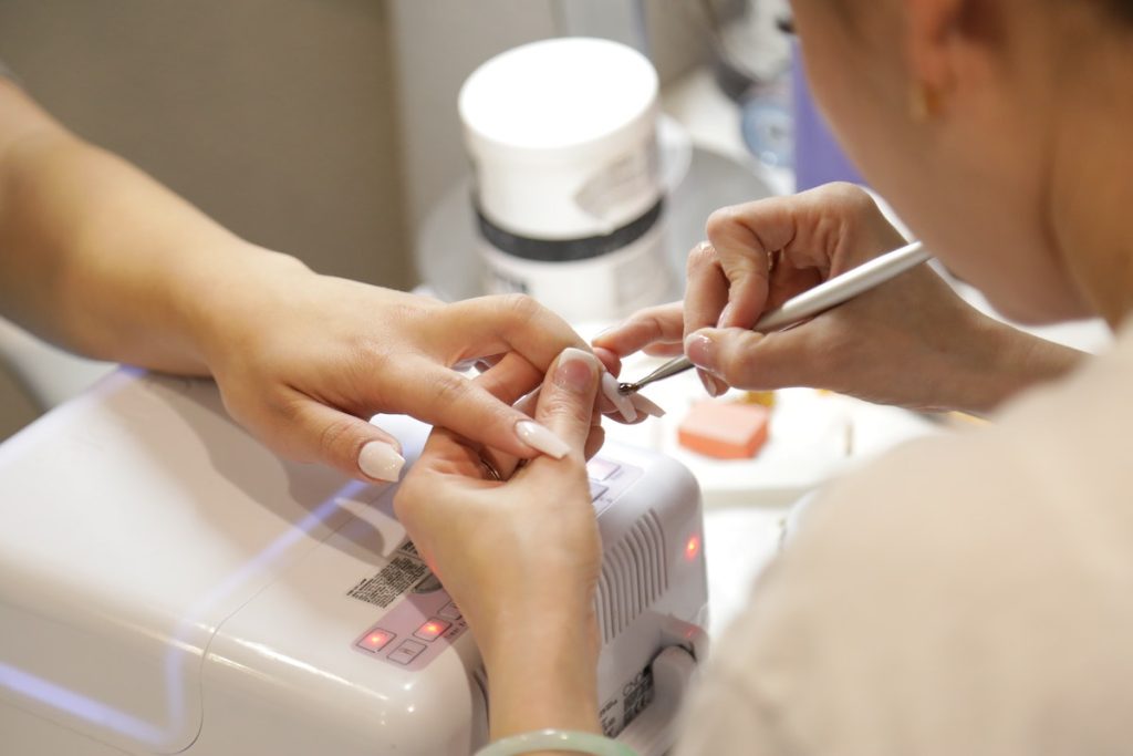 woman getting a manicure