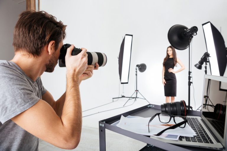 Photographer taking product photos in a studio